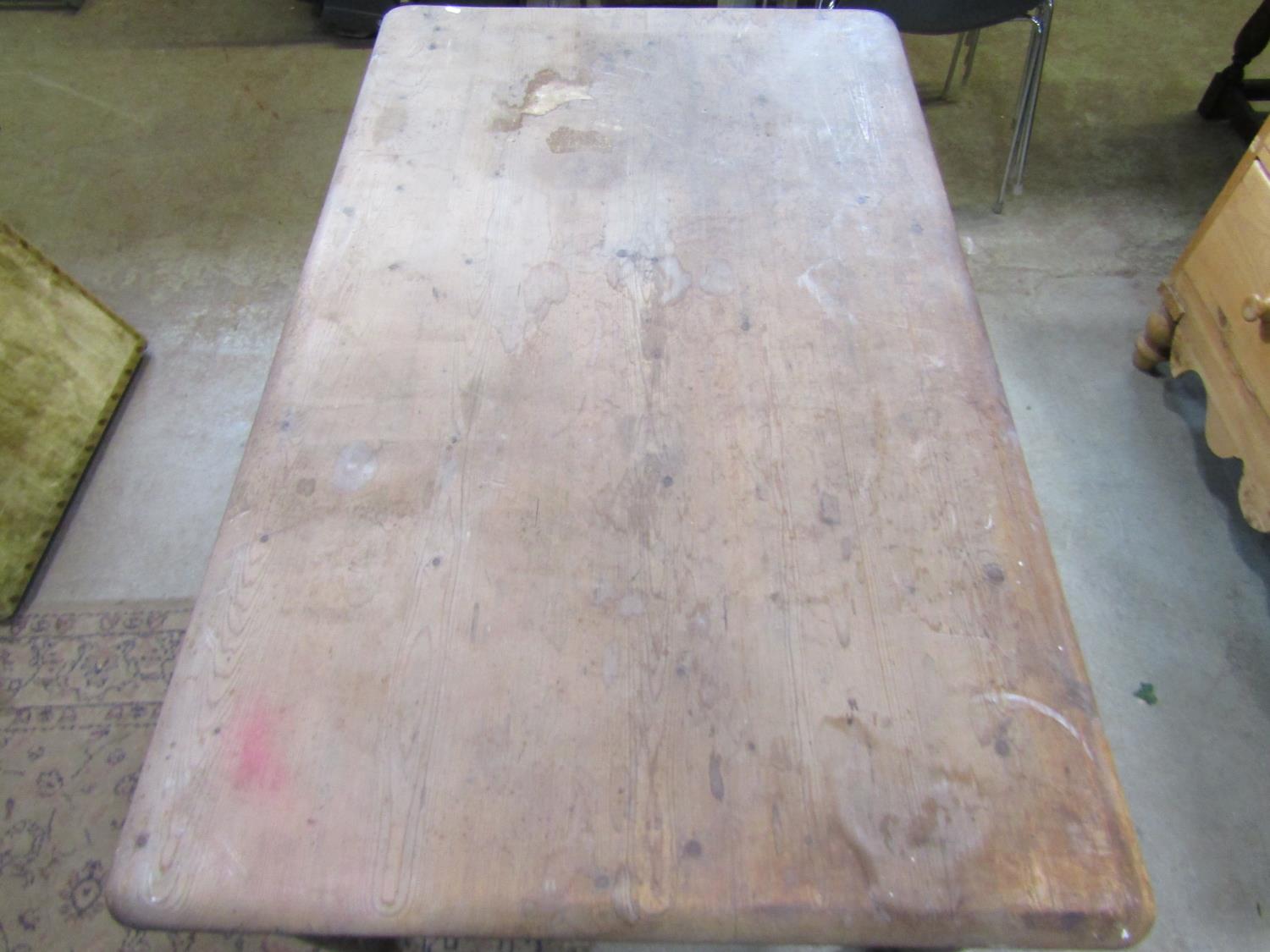 A Victorian scrub top pine kitchen table of rectangular form with moulded outline over an end frieze - Image 2 of 2