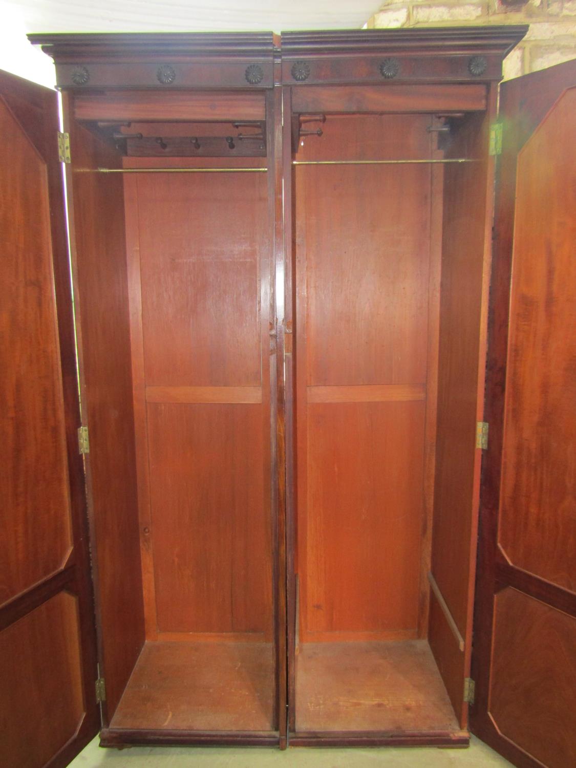 Two 19th century mahogany sentry box wardrobe sections enclosed by full length arched panelled doors - Image 2 of 2