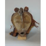 Vintage West African full tribal Gabon head dress mounted with a horn with shell bead work, upon a