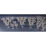 A collection of twenty good quality Edwardian cut crystal champagne glasses, each 11 cm high;