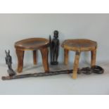 Tribal interest - Two African hardwood stools cut from a single piece of timber, 27cms high