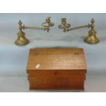 A pair of Victorian weighted brass candlesticks, together with a vintage sewing box with folding