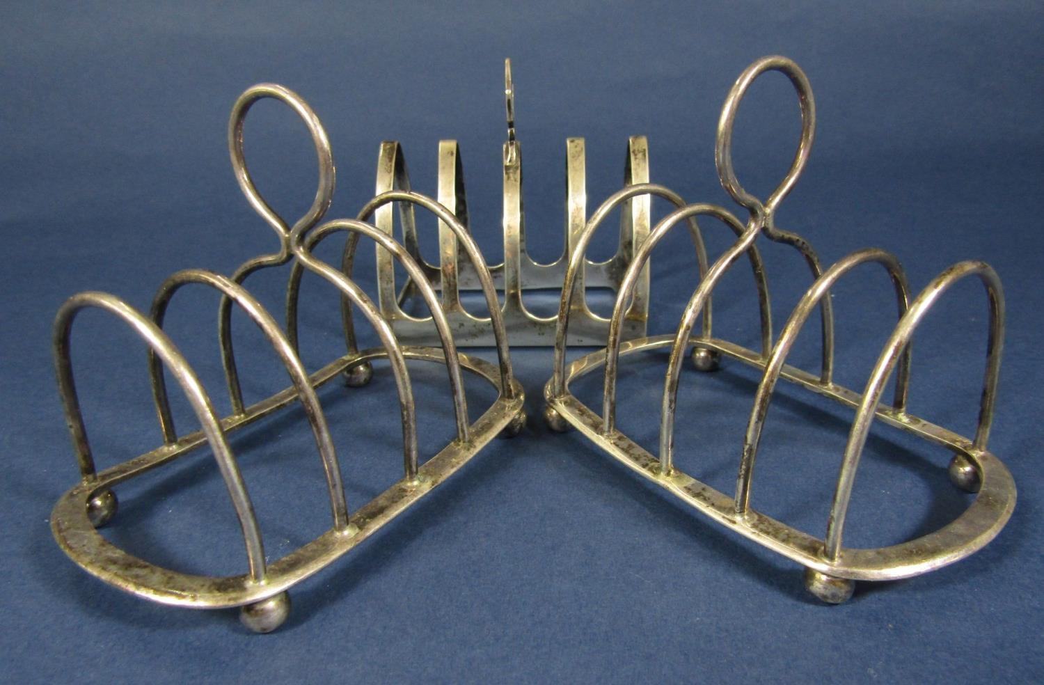 Three silver four divisional toast racks, 6oz approx