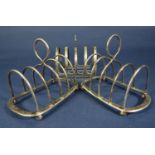 Three silver four divisional toast racks, 6oz approx