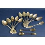 A collection of Georgian and Victorian Irish silver flatware to include 6 various dessert spoons