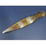 Early 20th century antler handled Scottish dirk, with leather sheath, silver bound decoration,