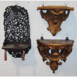 19th century gilded wall bracket, with shaped and pierced detail incorporating a female head, a