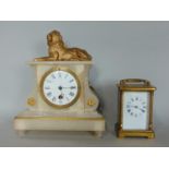 A simple brass carriage clock with eight day movement and a 19th century alabaster cased clock