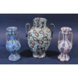 Millefiori glass vase garniture comprising three twin handle baluster vases, the largest 20 cm