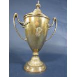 A good quality late aesthetic period silver twin handled trophy with fluted lid and base, with