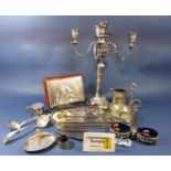 A good collection of silver plated items comprising two four branch candelabra (one af) part canteen