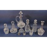 A collection of various glass decanters together with a good quality cut glass claret jug,