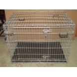 A Savic 'Pets Favourite' folding and portable dog crate, 107cm wide x 72cm deep x 80cm high approx