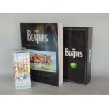 The Beatles Anthology DVD box set together with The Beatles Original Studio Recordings box set