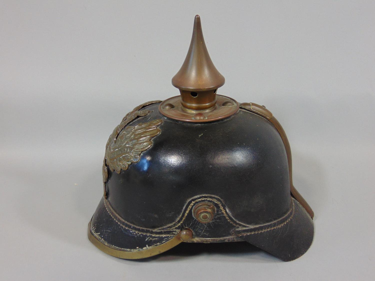 19th century German/Pussian Picklehaube helmet in black leather with a brass spike and applied crest - Image 2 of 5