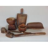 A quantity of treen including a primitive shovel, a grinder, a scoop, etc (6)