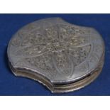 Possibly Anglo Indian 900 silver shaped compact with aesthetic piercing and mouldings to the top,