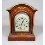 Edwardian walnut bracket type clock with arched, engraved steel dial, Roman numerals and twin