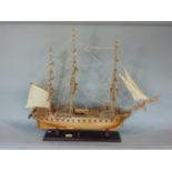 A fully rigged timber model of The USS Constitution, 82cm long
