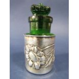 Crown Perfumery London, green glass bottle with crown shaped stopper within an Edwardian embossed