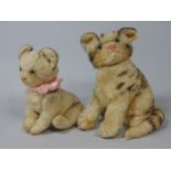 Vintage sitting tabby cat with jointed head by Steiff, height 20cm with pin in ear and pink stitched