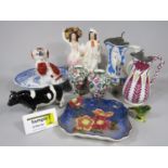 A collection of 19th century and later ceramics including Staffordshire figure groups, pair of