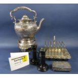 A Victorian silver plated spirit kettle on stand, and a further silver plated basket and toast rack;