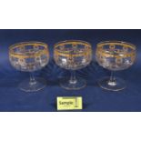 A collection of good quality faceted glass and gilt pudding bowls, all decorated with gilt swag