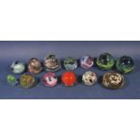 A collection of 13 mottled glass paperweights to include a pair of Mdina examples (13)