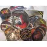 A collection of heavy metal/rock vinyl single picture discs, artists include Iron Maiden, Motorhead,