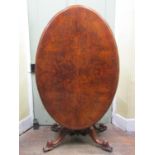 A Victorian walnut and burr walnut loo table, the oval top with quarter panelled veneers, raised
