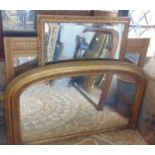 A Victorian overmantle mirror/chimney glass with moulded gilt arched frame with acanthus and further
