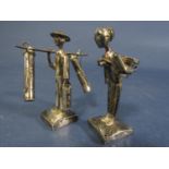 Pair of eastern white metal figures of male and female crop workers, 7cm high (2)