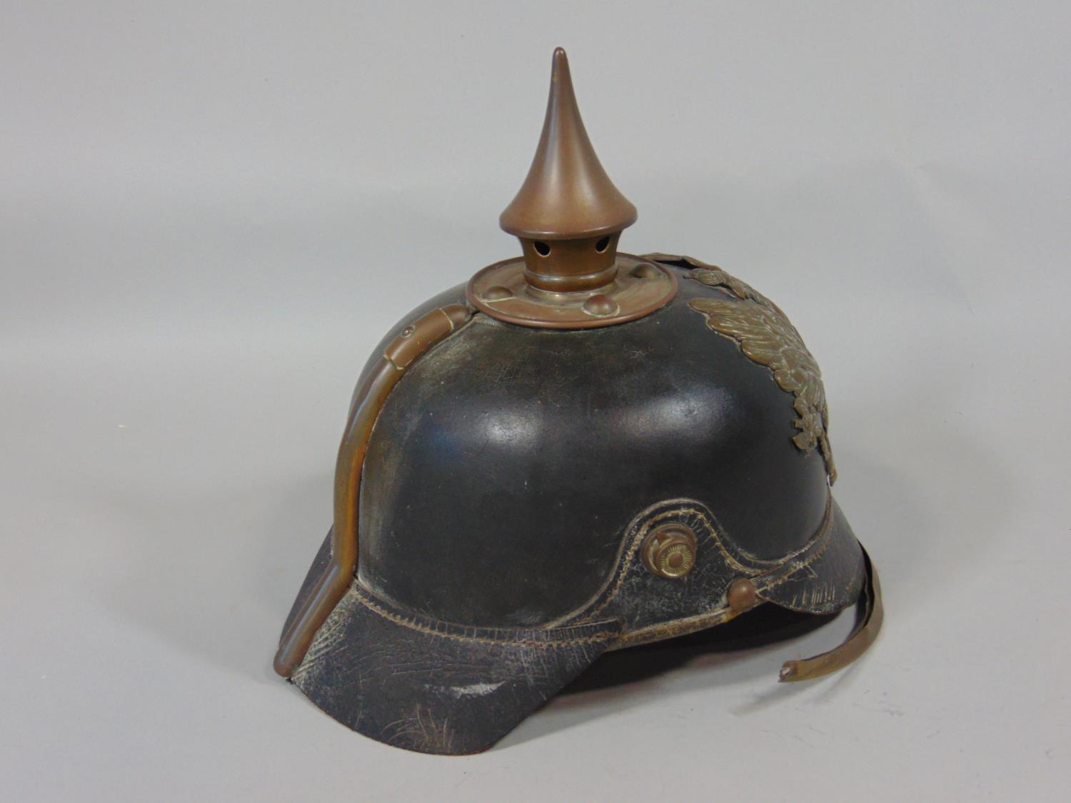 19th century German/Pussian Picklehaube helmet in black leather with a brass spike and applied crest - Image 5 of 5