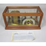 Negretti & Zambra of London oak cased Barograph with crescent dial marked Stormy, Rain, Change, Fair