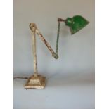 A Dugill's Patent Industrial iron work adjustable bench lamp with green enamel shade