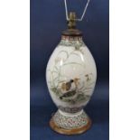 An oriental ceramic lamp base with painted water fowl decoration, 33 cm minus fittings