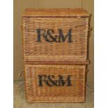 Two wicker hampers with fixed side carrying handles and painted lettering F & M for Fortnum and