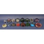 Sixteen glass paperweights with bubbled interiors