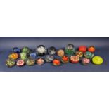 Collection of twenty three glass and other paperweights to include millefiori, floral and other