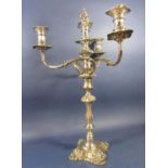 A good quality Sheffield plate three branch candelabra with rococo styling of scrolled acanthus