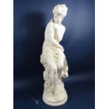 A plasterwork type figure of a female classical style figure seated on a rocky outcrop, 65cm approx