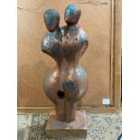A mid 20th century cast iron group of an embracing couple, 74cm high