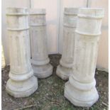 Four fluted columns, 65 cm high