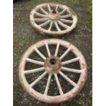 A pair of 19th century heavy gauge wagon wheels with original painted detail, 110 cm diameter