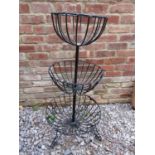 An ironwork three tier graduated planter