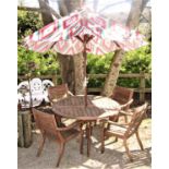 A good quality teak garden terrace set comprising circular table with slatted top on swept supports,