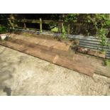 Several lengths of weathered hardwood principally teak, the majority 3.5 metres in length and 2 to 3