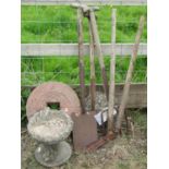 A grind wheel, a reclaimed bird bath with frog detail, a few vintage garden tools, etc