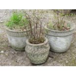 Three reclaimed garden pots with individual moulded detail, 40 cm diameter and smaller